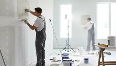 Knoxville, TN drywall repair by painting contractors fixing cracks and holes in a home interior